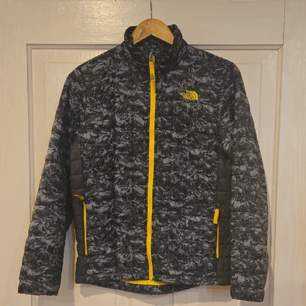 The North Face Black and Gray Camo Puffer Jacket with Yellow Accents